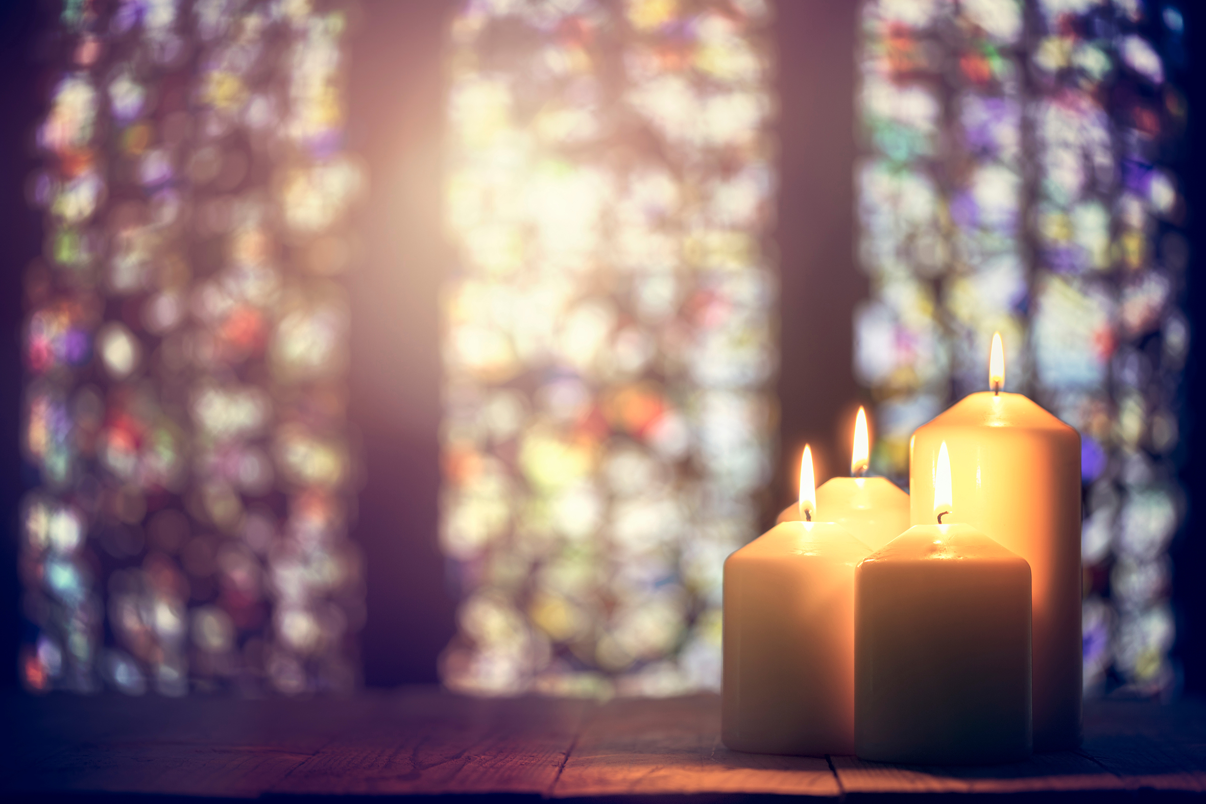 Photograph of candles in a church
