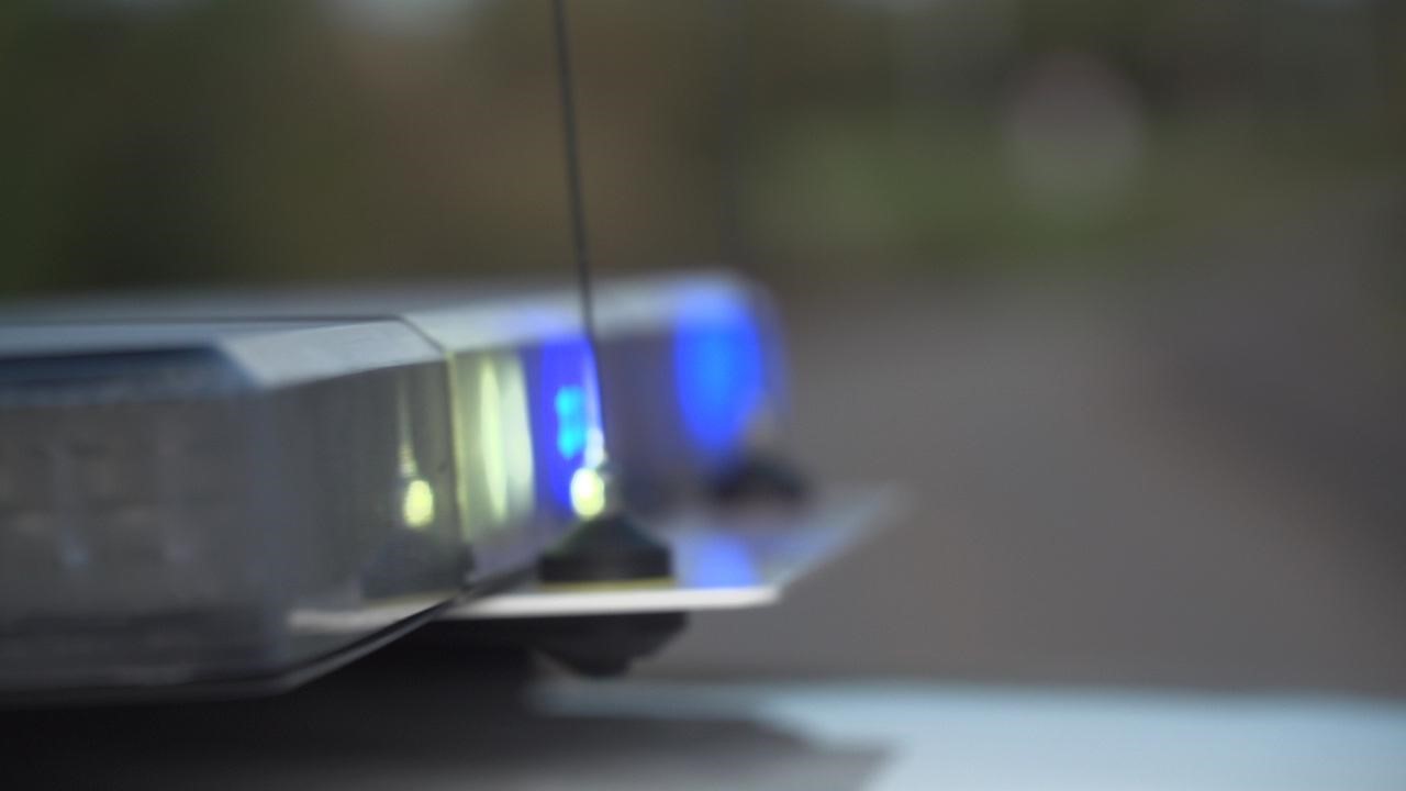 Photograph of blue lights on a police car