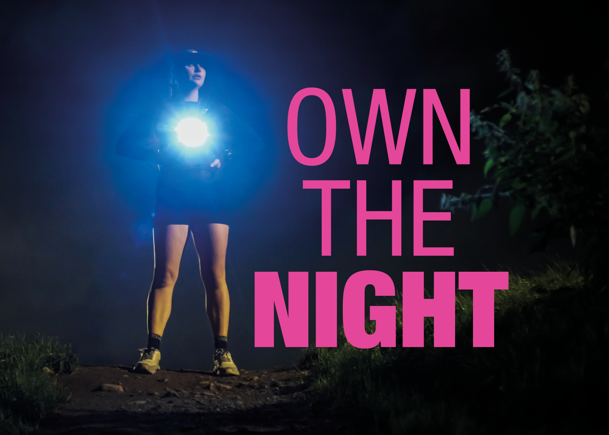 Photograph of a female runner in the dark