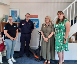 NWP and Dangerpoint staff with the seized e-scooter.