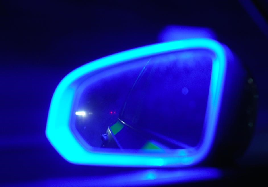 Photograph of a police car wing mirror