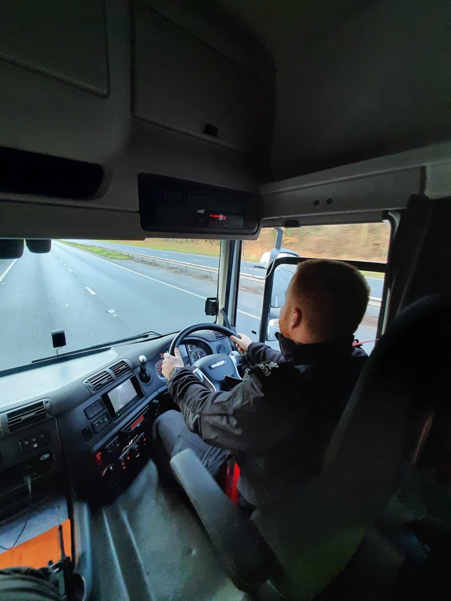 Photograph of a police officer driving the Op Tramline cab