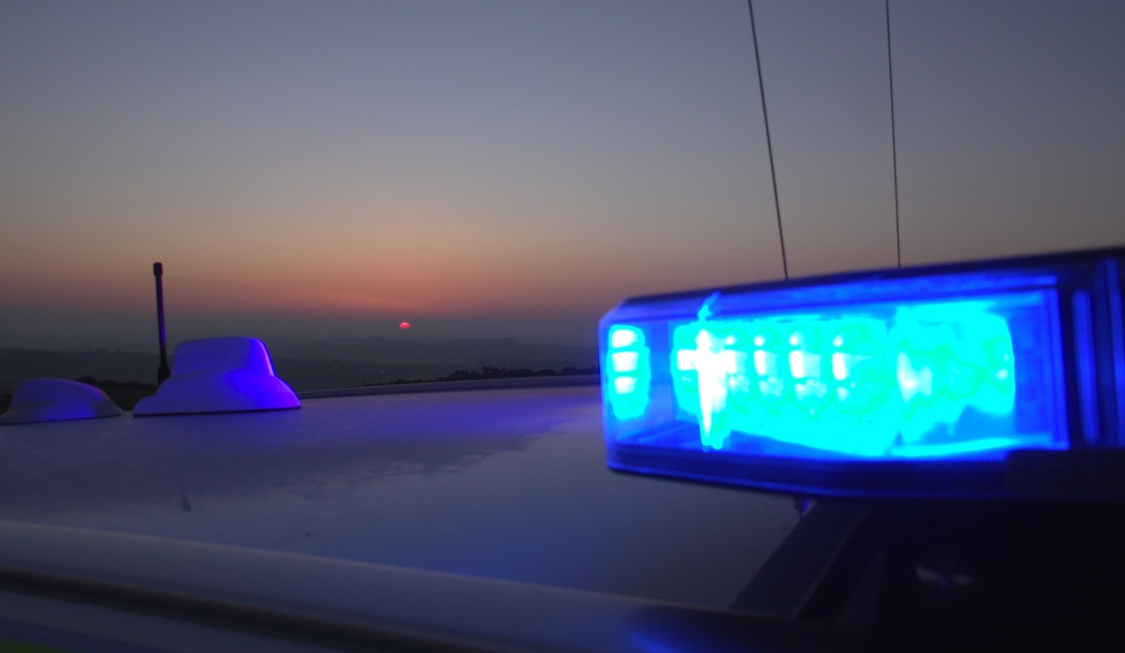 Photograph of a police car's blue light