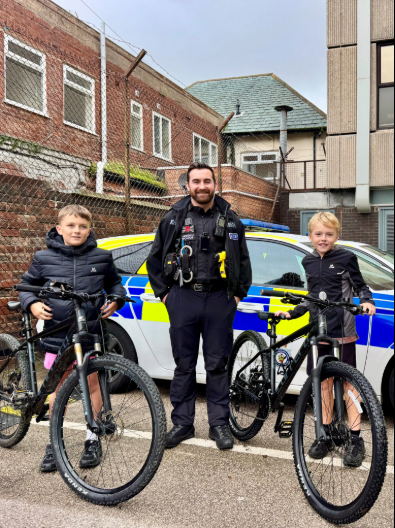 PC Hart, pictured with Harry and Jack. Image: NWP